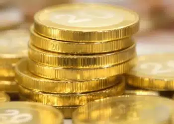 Pièces de 20 francs suisses empilées.