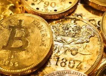 Pièces d'or Krugerrand et pièces commémoratives anciennes.