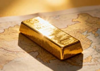 Lingot d'or sur fond de carte de l'Asie.
