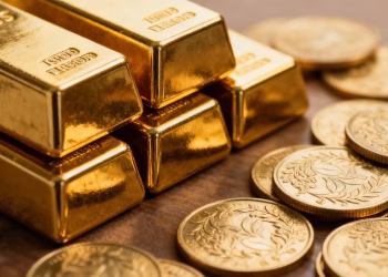 Lingots et pièces d'or brillants