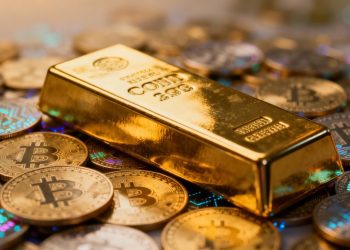 Lingot d'or sur fond de pièces numériques