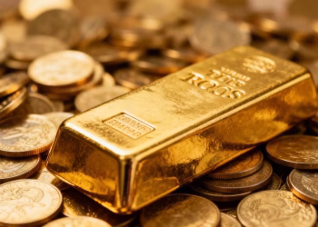 Barre d'or sur des pièces d'or pour la retraite.