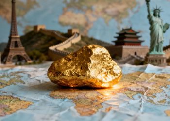 Lingot d'or sur une carte du monde