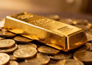 Barre d'or sur des pièces d'or pour la retraite.