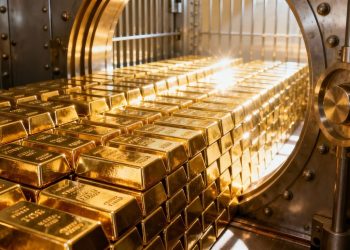 Lingots d'or dans un coffre-fort sécurisé.