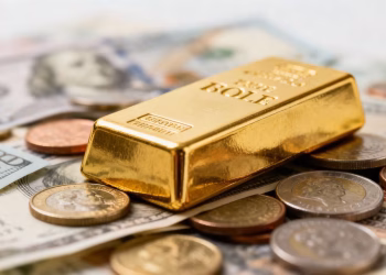 Barre d'or dans un portefeuille diversifié d'actifs financiers.