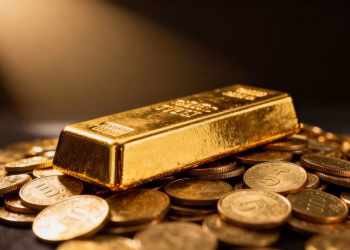 Lingot d'or sur des pièces d'or