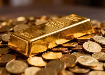 Barre d'or et pièces d'or pour la retraite.