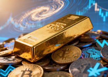 Barre d'or sur des pièces et des symboles de cryptomonnaie.