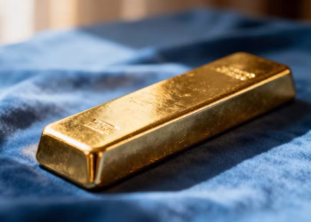 Barre d'or sur fond bleu doux, évoquant la sérénité financière.