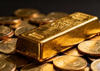 Barre d'or et pièces d'or pour la sécurité financière.