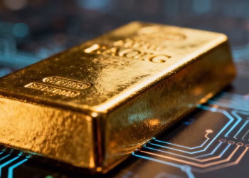 Barre d'or brillante avec un arrière-plan numérique flou.