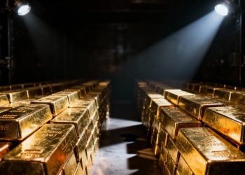 Lingots d'or dans un coffre-fort, symbolisant la sécurité.