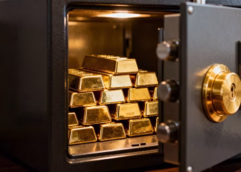 Coffre-fort numérique sécurisé avec des lingots d'or brillants.