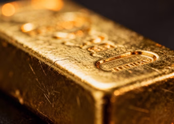 Barre d'or brillante, symbole de richesse et de patrimoine.