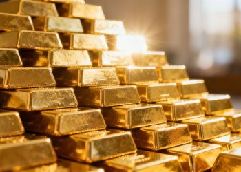 Lingots d'or empilés, symbolisant la richesse des banques centrales.