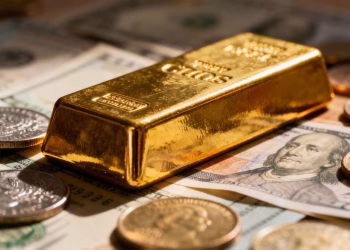 Barre d'or parmi d'autres actifs financiers.