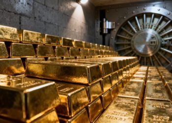 Lingots d'or dans un coffre-fort sécurisé.