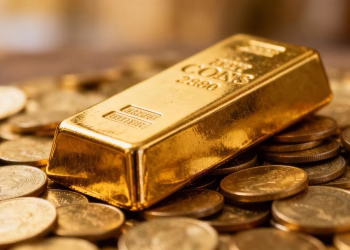 Barre d'or et pièces d'or, investissement à long terme.