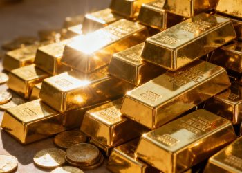 Lingots d'or empilés, symbolisant la richesse des banques centrales.