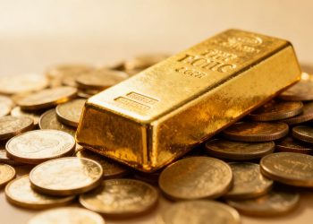 Lingot d'or sur des pièces d'or.