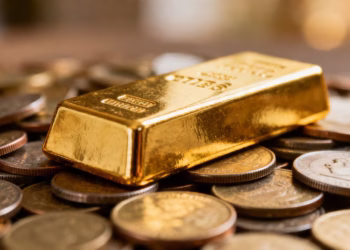 Lingot d'or sur des pièces de monnaie