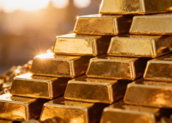 堆叠的金条，金色的反射。