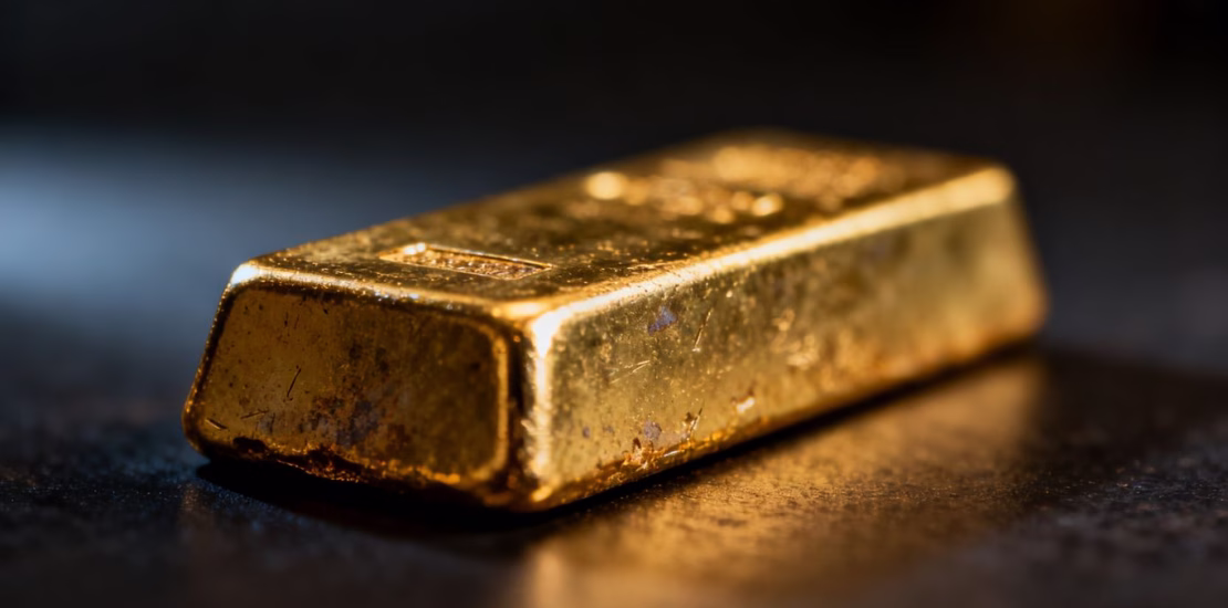 Barre d'or sur fond sombre