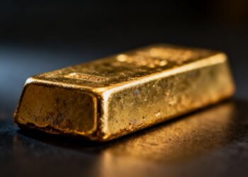 Barre d'or sur fond sombre