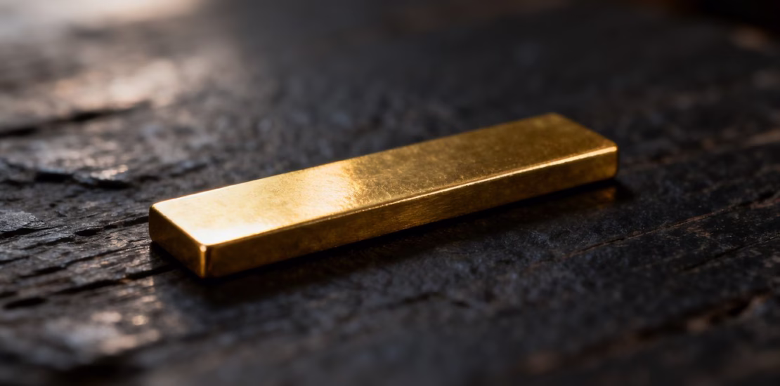 Lingot d'or sur fond sombre