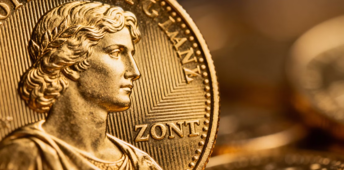 Une once d'or brillante sur fond neutre.