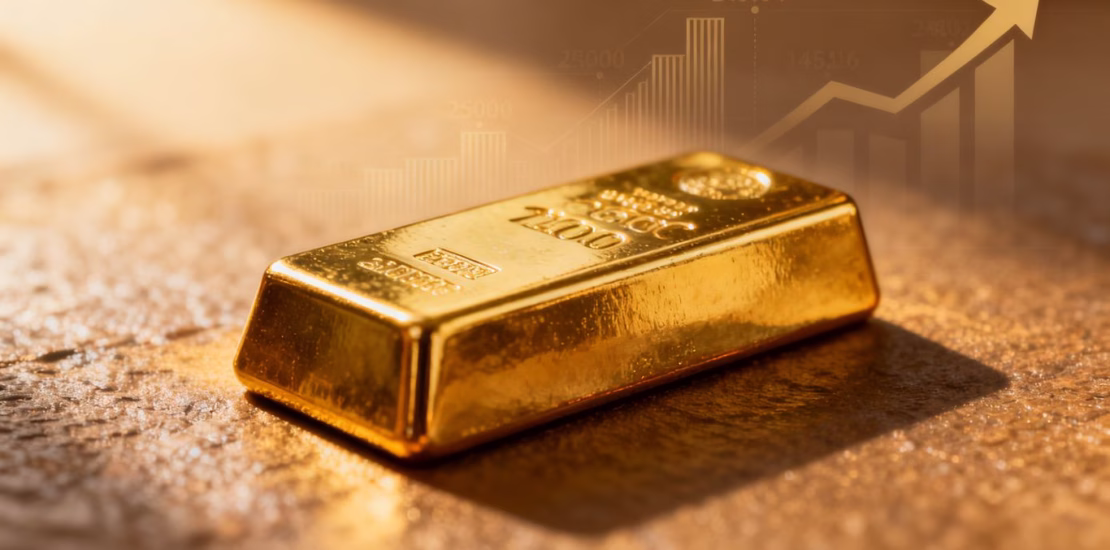 Lingot d'or sur fond économique flou.