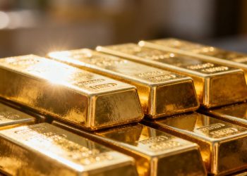 Glänzende Goldbarren gestapelt, Nahaufnahme.