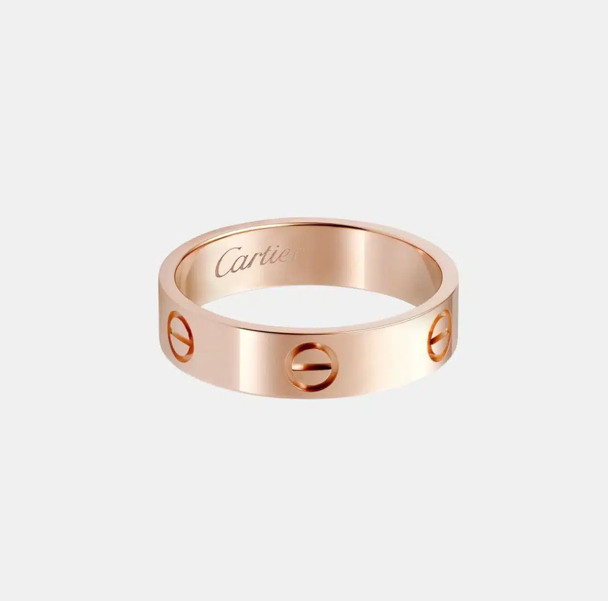 Bague Love Cartier en or rose, largeur 5,5 mm — photographie du modèle, cote d’occasion GOLDMARKET