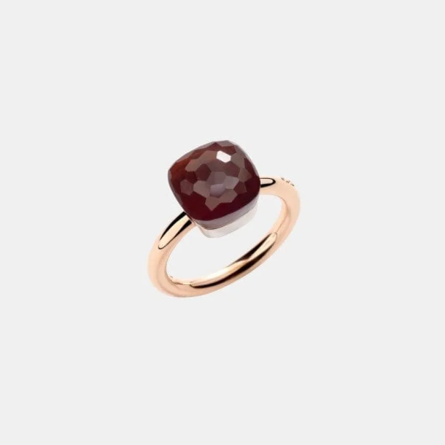 Bague Nudo Pomellato en or, grenat — photographie du modèle, cote d’occasion GOLDMARKET