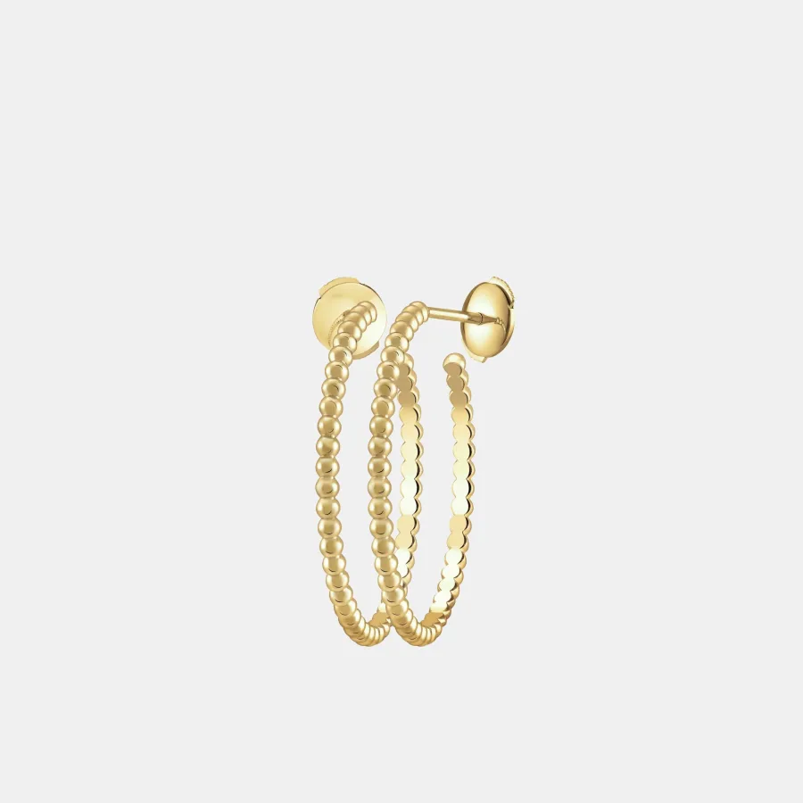 Boucles d'oreilles Perlée Van Cleef & Arpels en or jaune — photographie du modèle, cote d’occasion GOLDMARKET