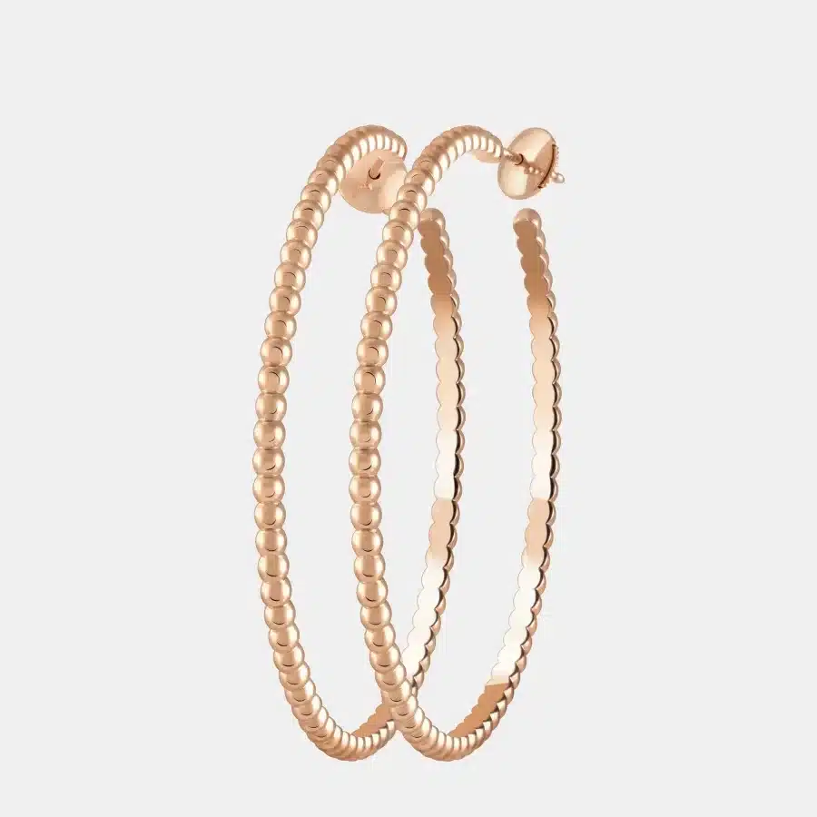 Boucles d'oreilles Perlée Van Cleef & Arpels en or rose — photographie du modèle, cote d’occasion GOLDMARKET