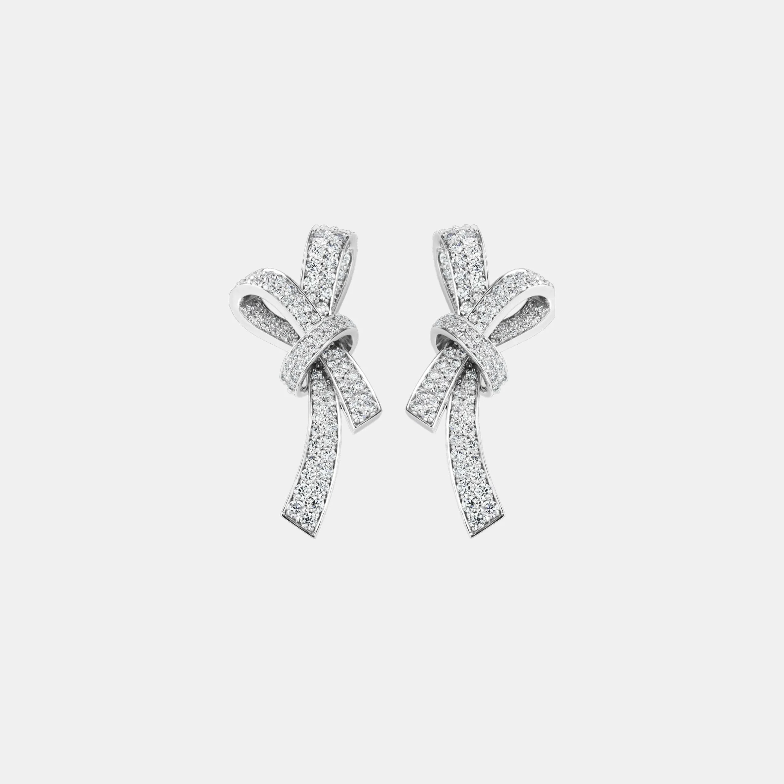 Boucles d'oreilles Ruban Chanel en or blanc, diamant — photographie du modèle, cote d’occasion GOLDMARKET