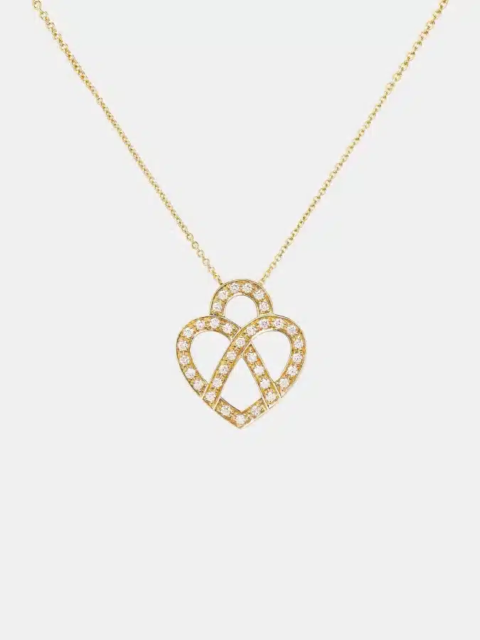 Collier Coeur Entrelacé Poiray en or jaune, diamant 0.1ct — photographie du modèle, cote d’occasion GOLDMARKET