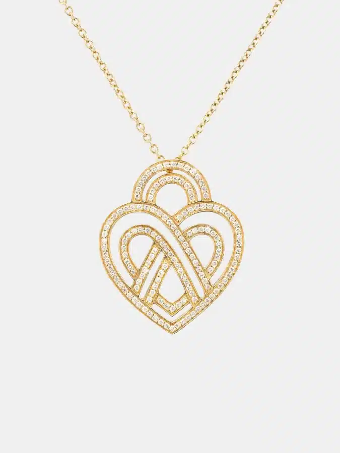 Collier Coeur Entrelacé Poiray en or jaune, diamant 0.6ct — photographie du modèle, cote d’occasion GOLDMARKET