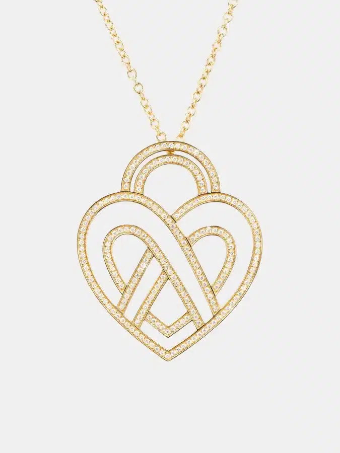 Collier Coeur Entrelacé Poiray en or jaune, diamant 1.2ct — photographie du modèle, cote d’occasion GOLDMARKET