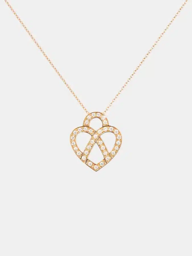 Collier Coeur Entrelacé Poiray en or rose, diamant 0.1ct — photographie du modèle, cote d’occasion GOLDMARKET