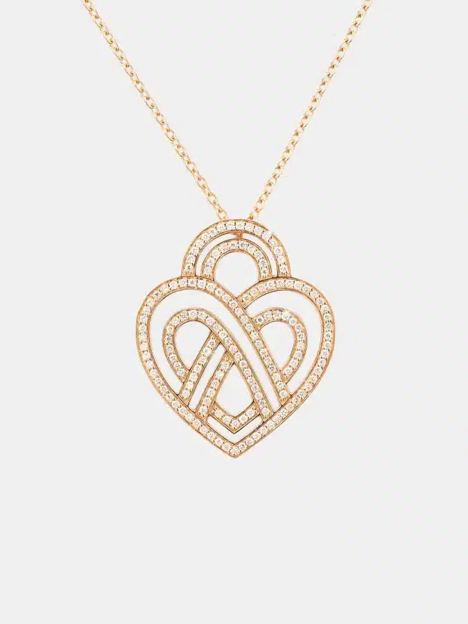 Collier Coeur Entrelacé Poiray en or rose, diamant 0.6ct — photographie du modèle, cote d’occasion GOLDMARKET