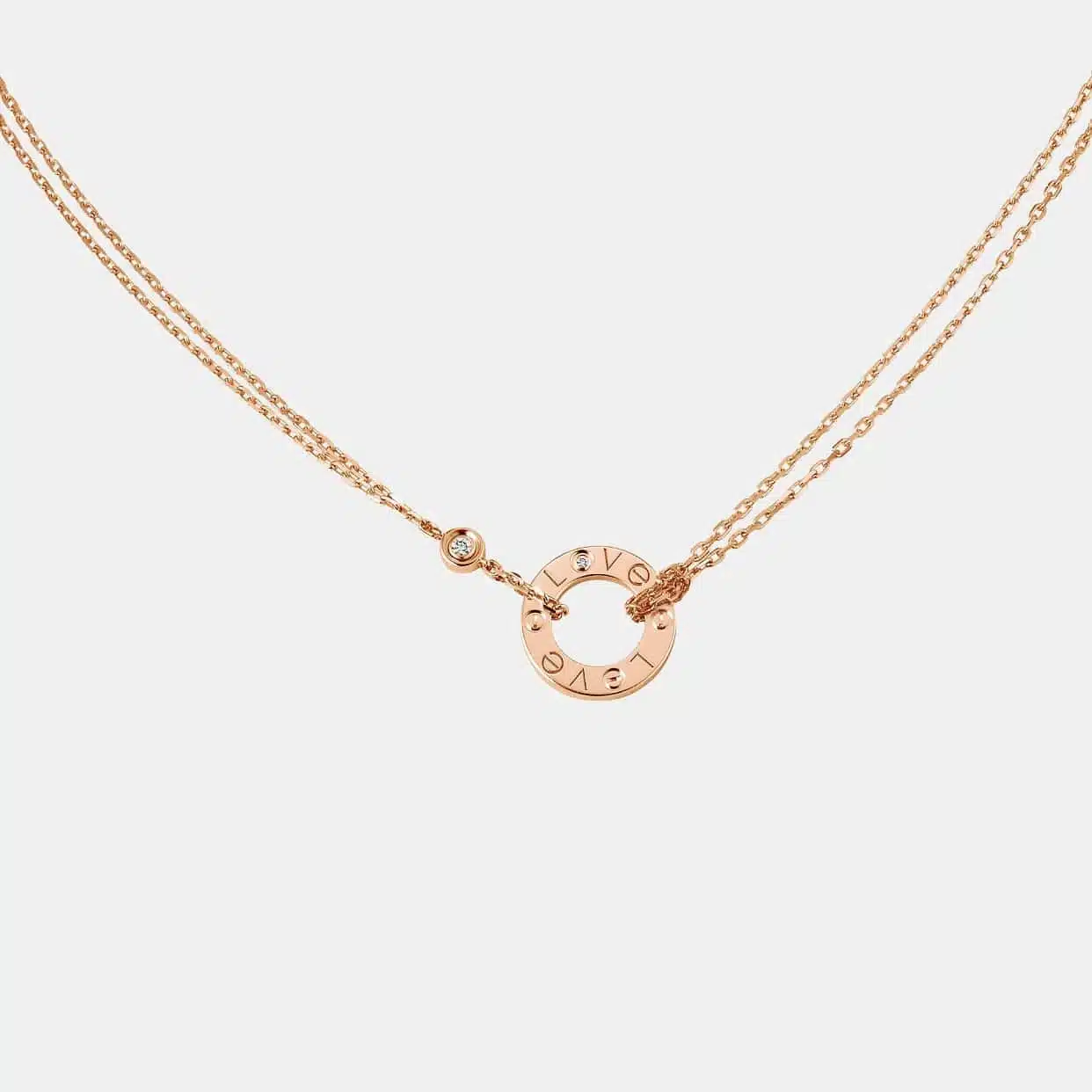 Collier Love Cartier en or rose, 2 diamants — photographie du modèle, cote d’occasion GOLDMARKET