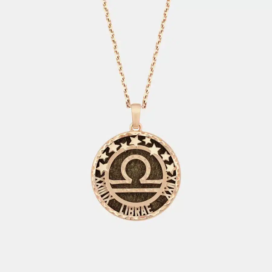 Collier Zodiaque Van Cleef & Arpels en or rose, obsidienne — photographie du modèle, cote d’occasion GOLDMARKET