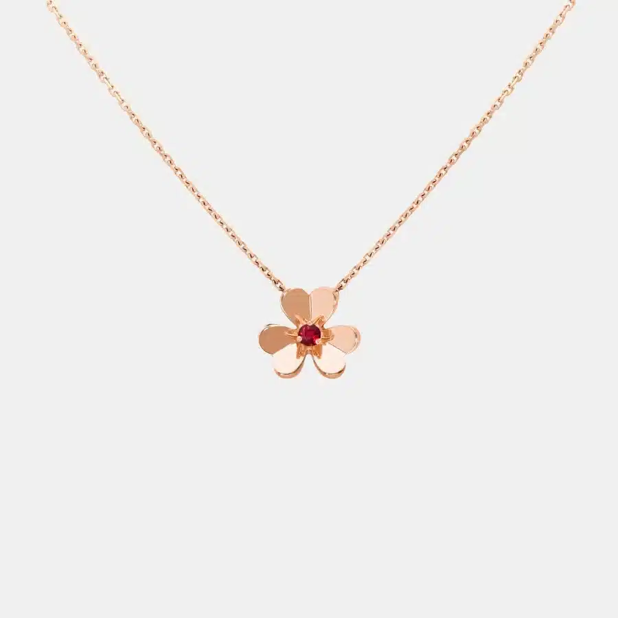 Pendentif Frivole Van Cleef & Arpels en or rose, rubis 0.07ct — photographie du modèle, cote d’occasion GOLDMARKET