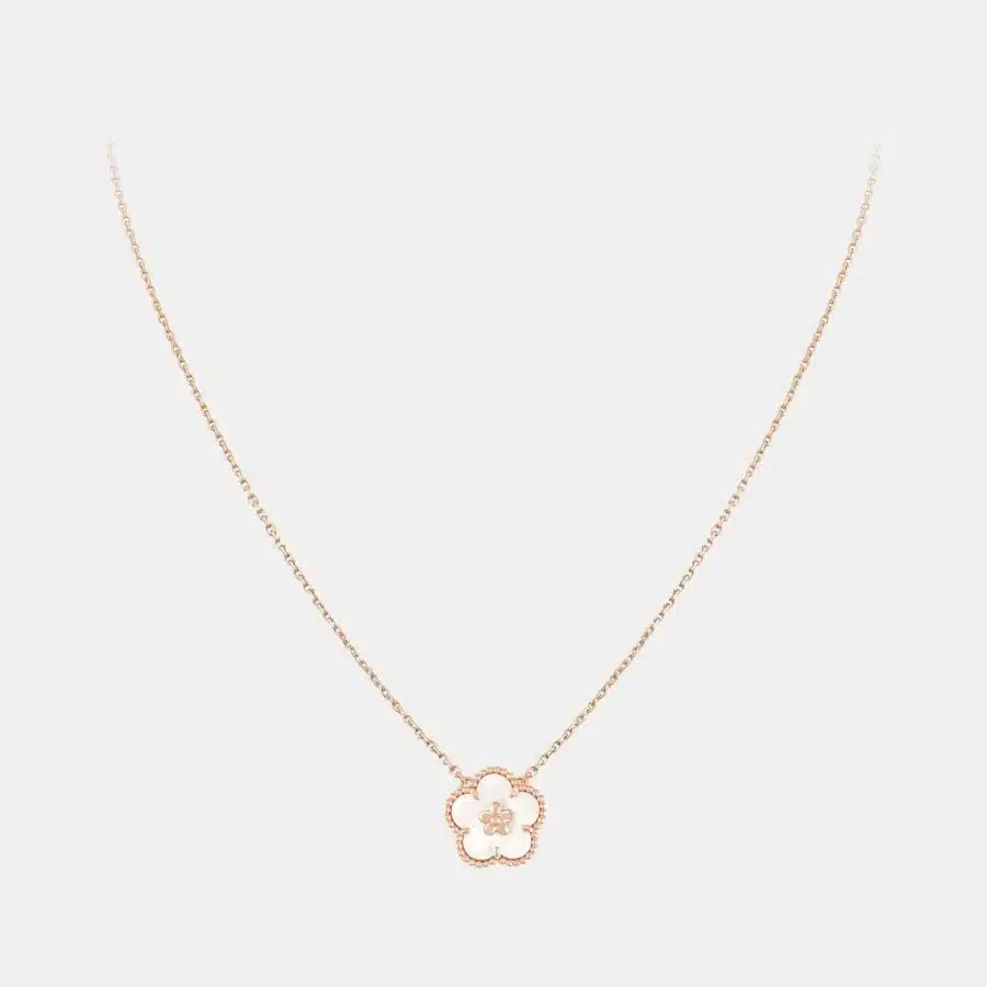 Pendentif Lucky Spring Van Cleef & Arpels en or rose, perle