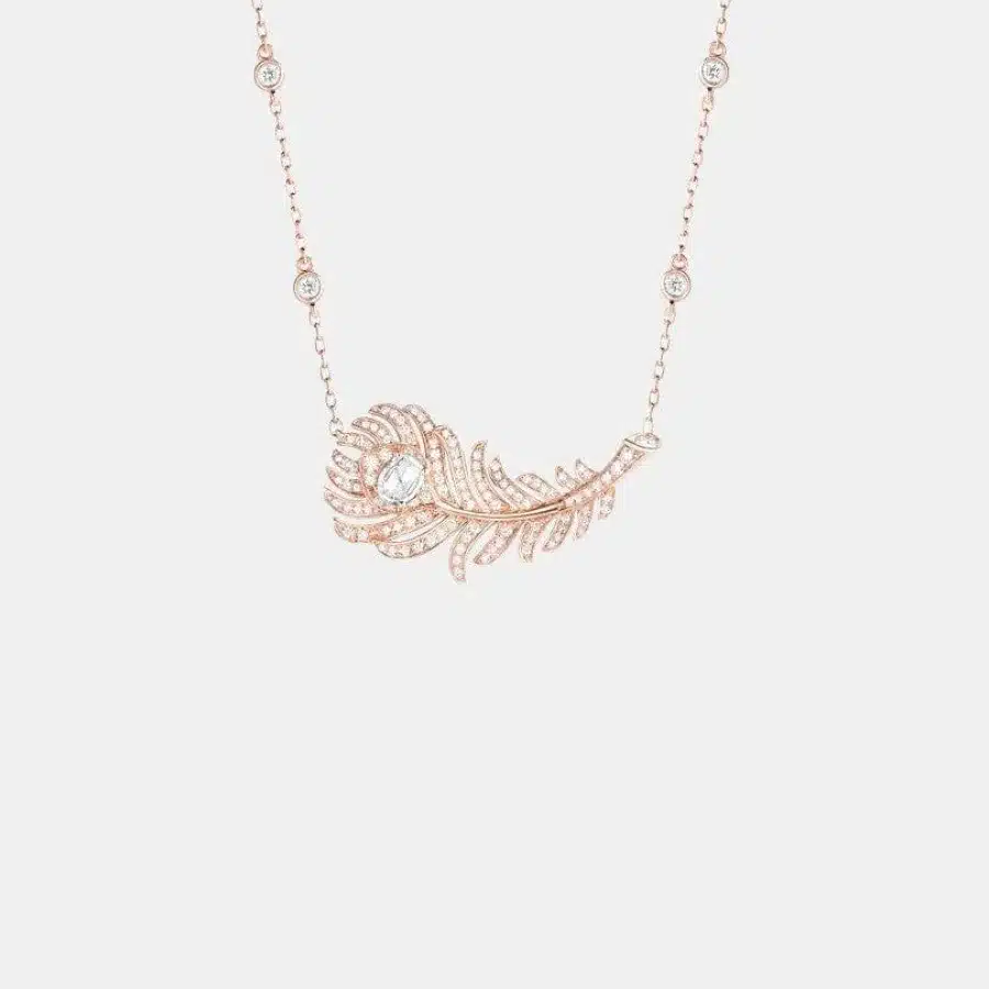 Pendentif Plume de Paon Boucheron en or rose, diamant 0.24ct — photographie du modèle, cote d’occasion GOLDMARKET