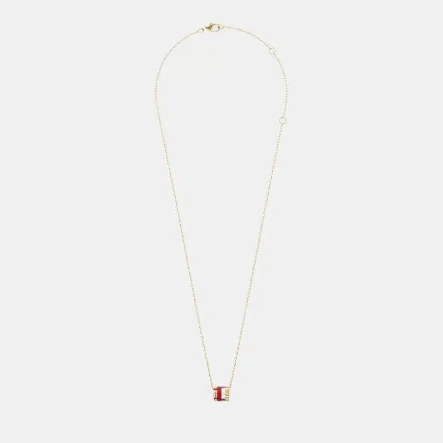 Pendentif Quatre Boucheron en or, diamant 0.01ct — photographie du modèle, cote d’occasion GOLDMARKET