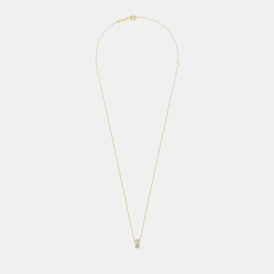 Pendentif Quatre Boucheron en or, diamant 0.1ct — photographie du modèle, cote d’occasion GOLDMARKET